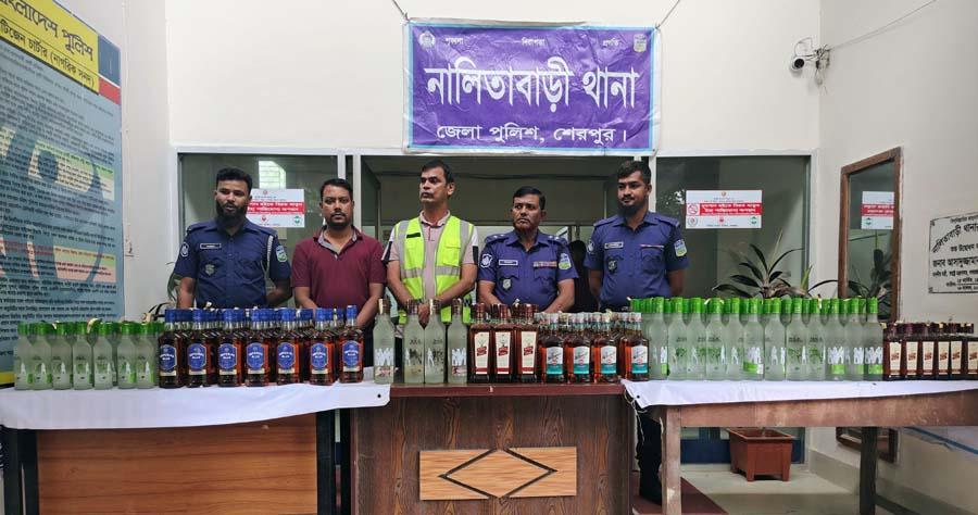 নালিতাবাড়ীতে ২৯৭ বোতল ভারতীয় মদসহ প্রাইভেটকার জব্দ
